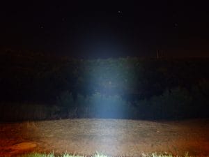 A photo of the LR12 illuminating an area at a distance of about 100 metres or so.