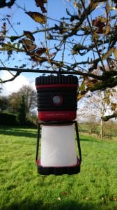 A photo showing how the L1 can be hung using the metal clip