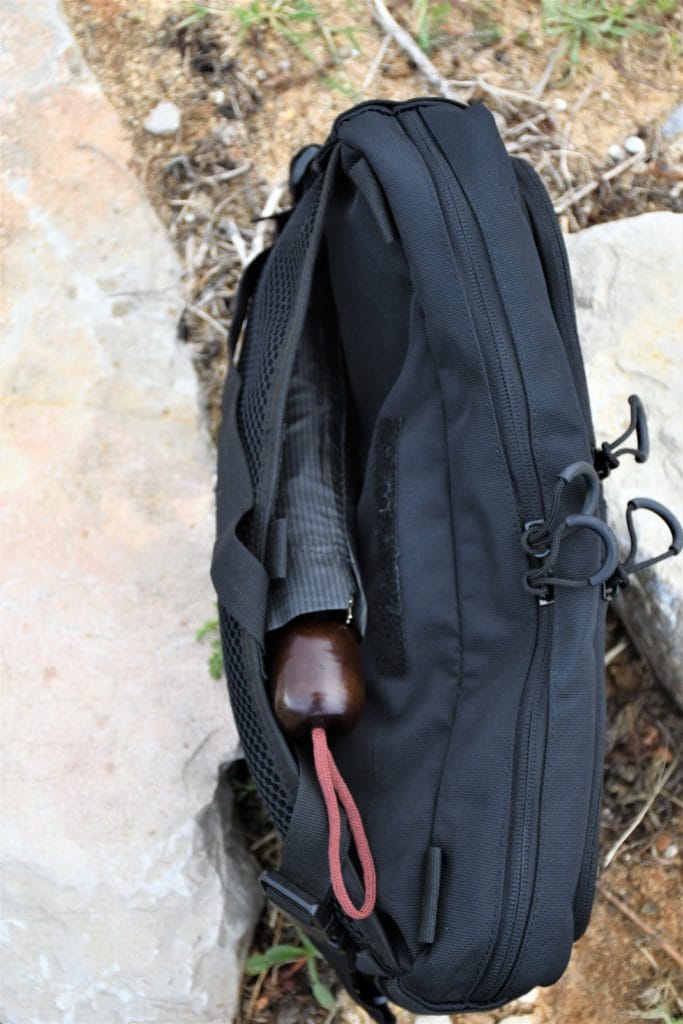 I keep an umbrella inside the mesh pocket of the NEB10