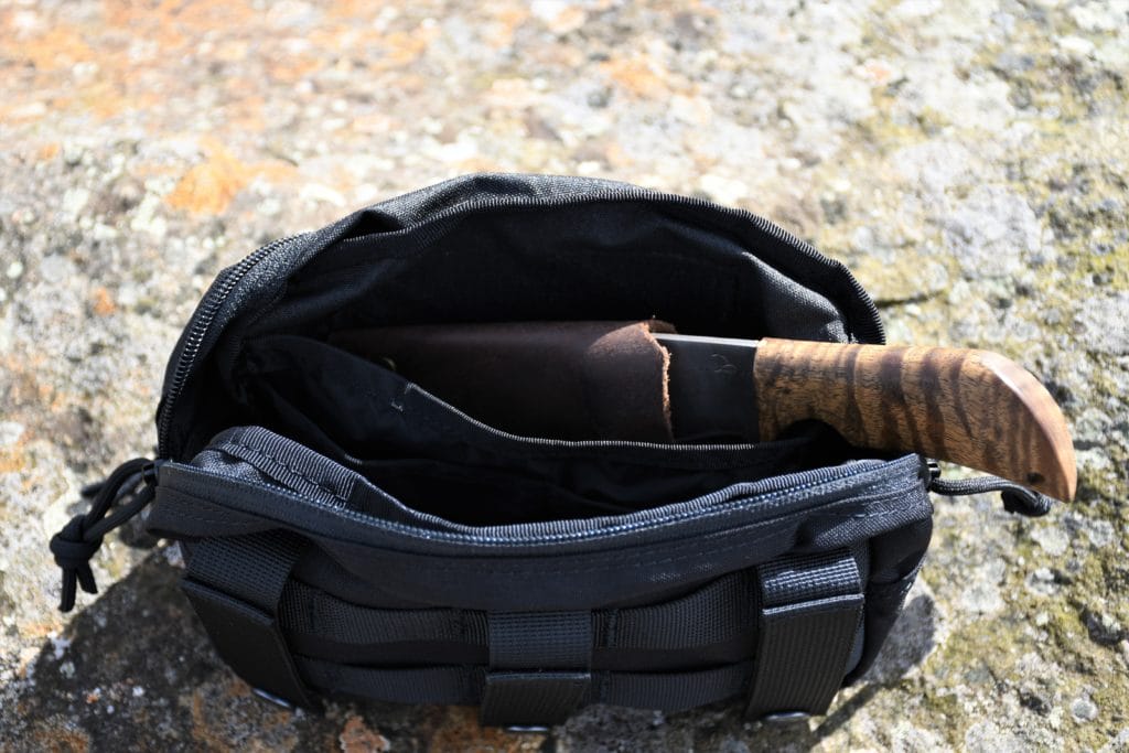 I keep a small fixed-blade knife in here