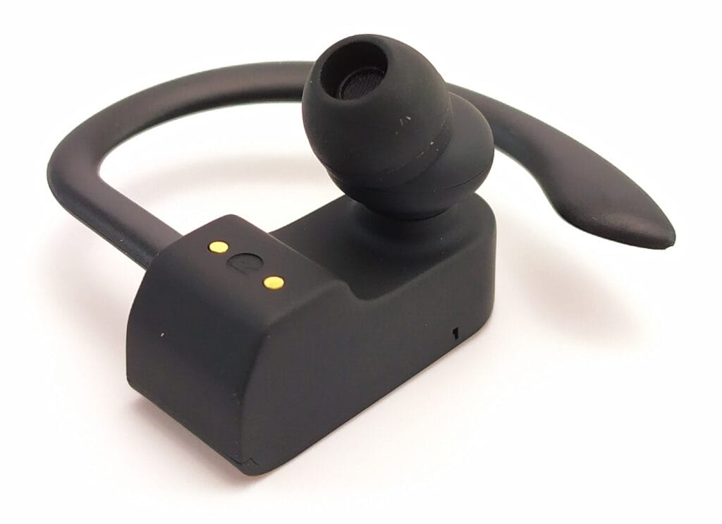 Image shows an earbud laying upward showing the ear tip.