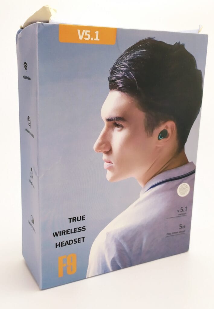 Image shows the earphone outer box, the box has notable physical damage to it.