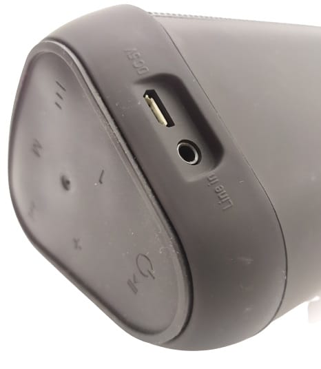 Image shows the multi-function control area, on the side there is the charging port and a AUX port.