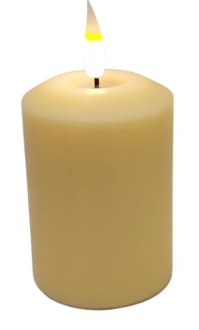 Image shows the candle lit up.