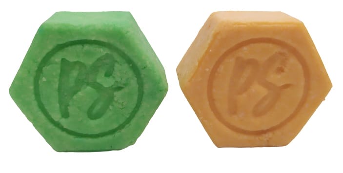 Image shows the shampoo bars side by side.