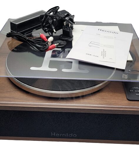 Hernido Vinyl Record Player Image shows the included contents in a laid out position.