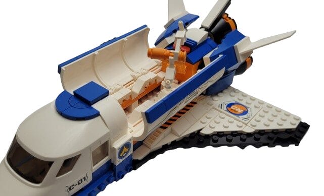 Exercise N Play Image shows the space shuttle with the access doors open to reveal the crane.