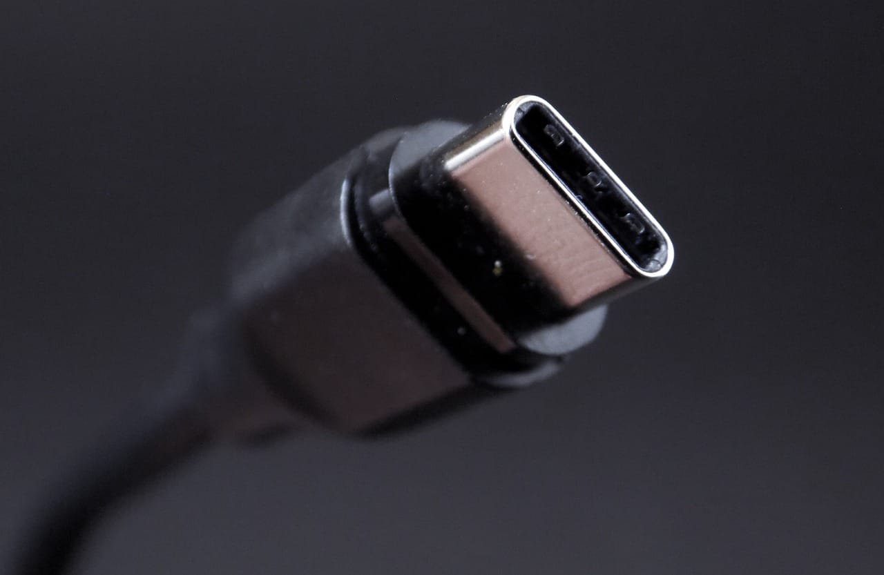 USB: Evolved from Chaos to Charge Image shows a USB-C Plug.