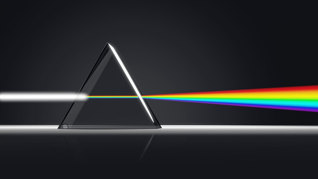 Image shows light passing through a prism...From Rainbows to Pixels