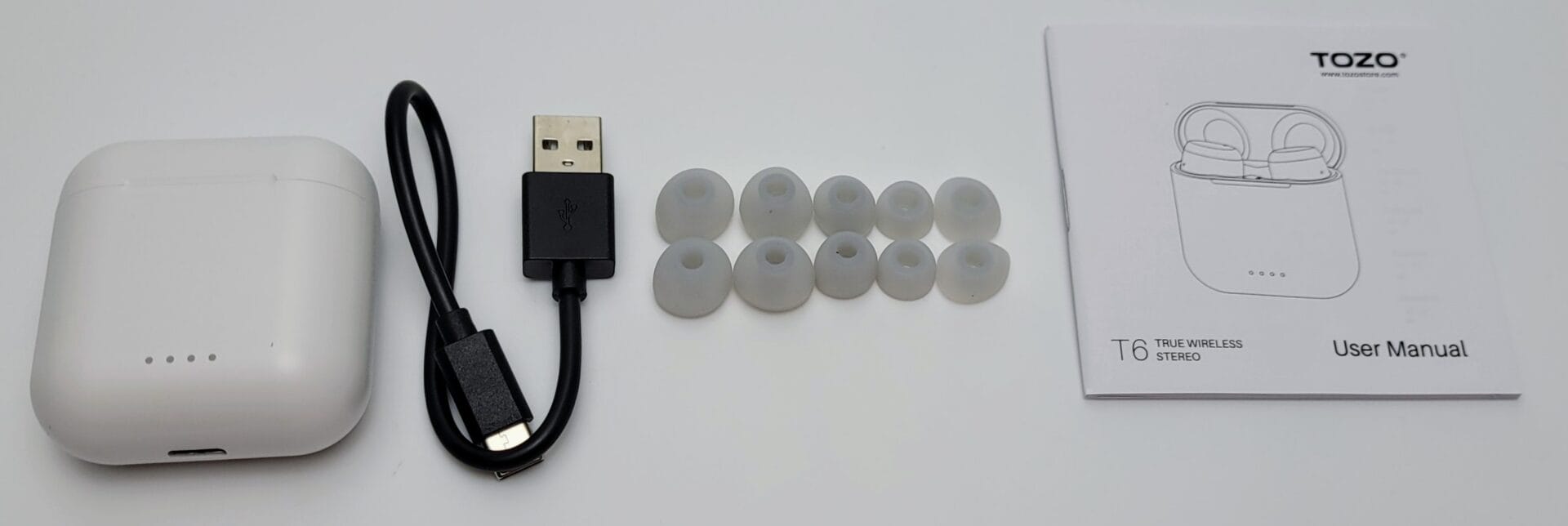 TOZO T6 Wireless Earbuds Image shows the included contents in a laid out position.