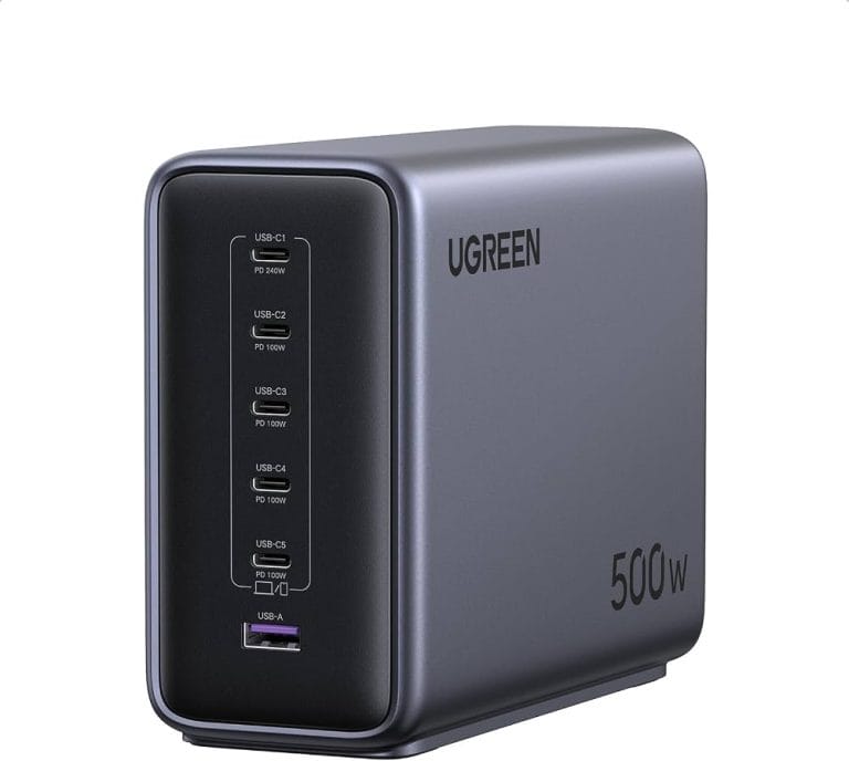 The UGREEN Nexode 500W 6-Port GaN Desktop Charger in grey, placed on a white surface. It features the "UGREEN 500W" branding on the side, with multiple ports visible (5 USB-C, 1 USB-A). A short black power cord is attached to the charger. The image was captured on 31 May 2025 at 10:08 AM BST.