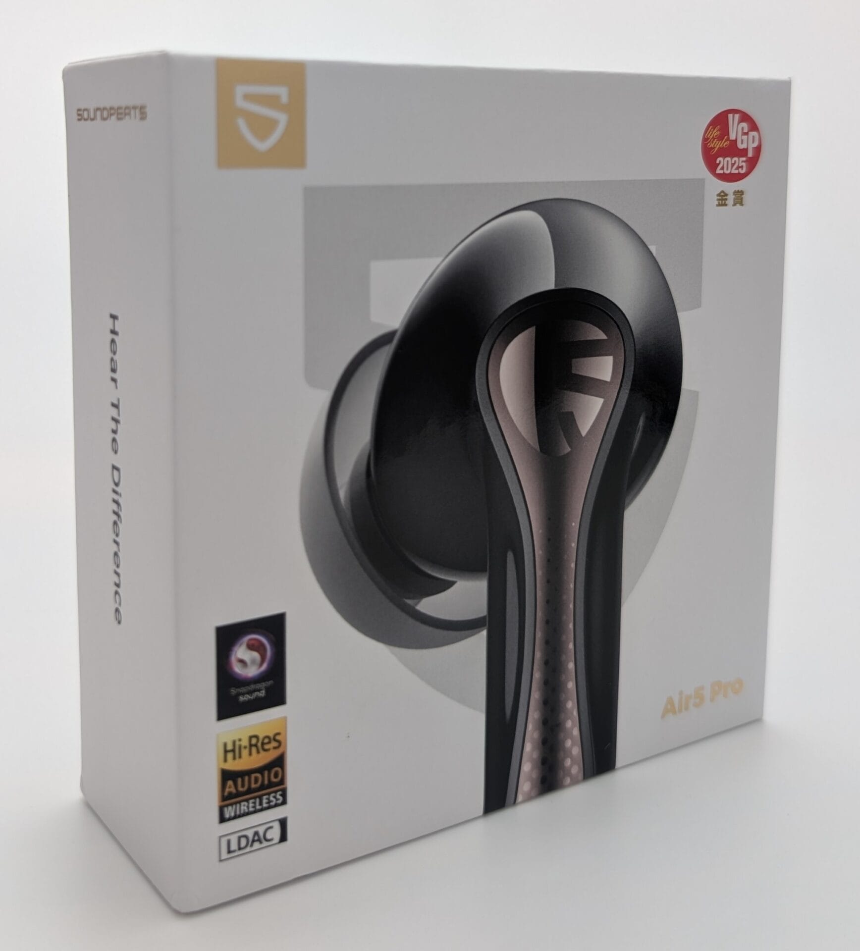 Alt text: Image of the SoundPEATS Air5 Pro earbuds packaging, featuring a sleek black earbud with a glossy finish and a metallic design element. The box is predominantly white with the SoundPEATS logo, "Hear The Difference" slogan, and certifications including Hi-Res Audio Wireless and LDAC. A VGP 2025 award badge is displayed on the top right corner.