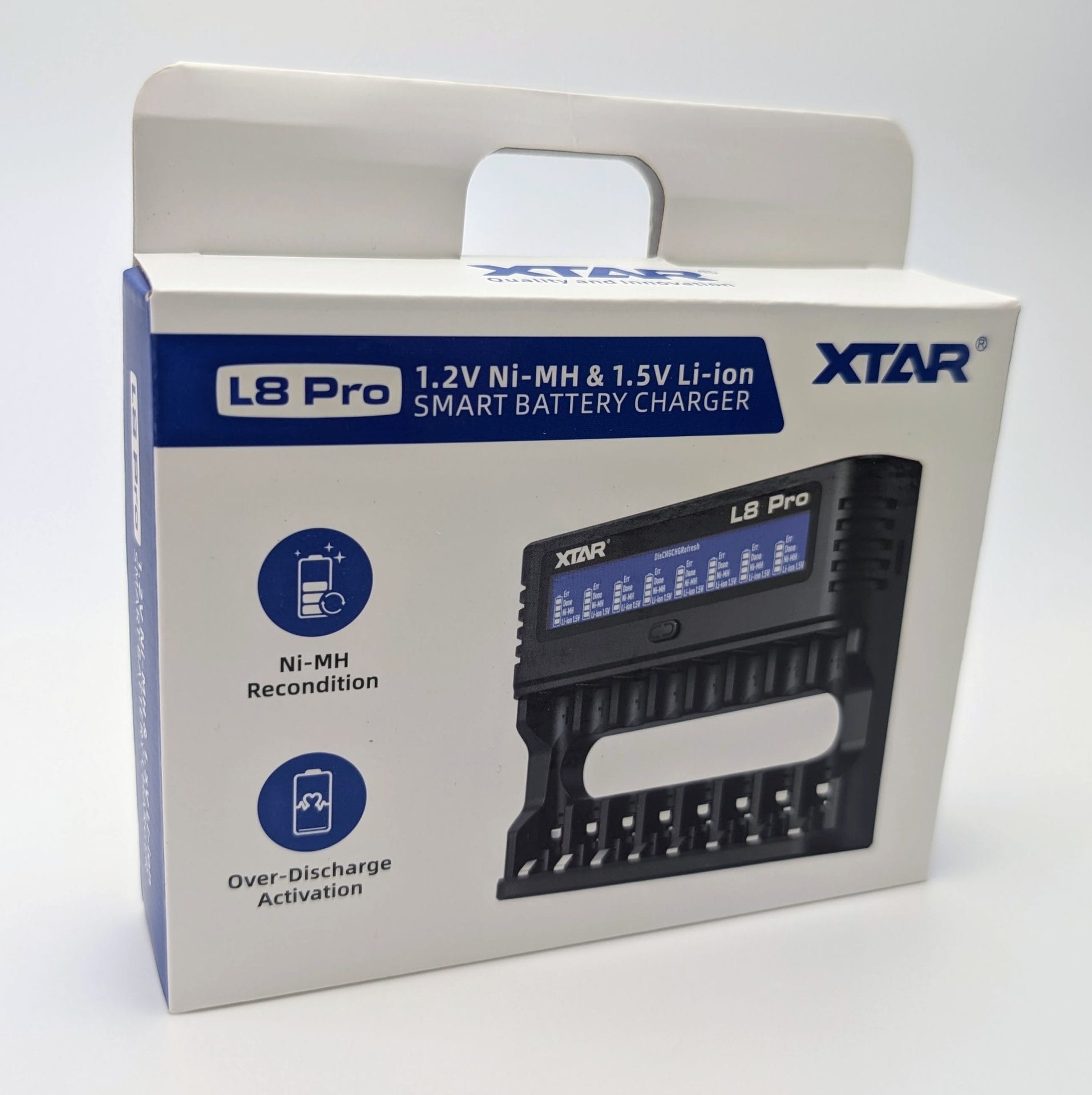 White and blue retail packaging for the XTAR L8 Pro smart battery charger. The box prominently displays “L8 Pro 1.2V Ni-MH & 1.5V Li-ion SMART BATTERY CHARGER,” the XTAR logo, icons highlighting Ni-MH Recondition and Over-Discharge Activation features, and a photo of the black 8-slot charger with its digital display.